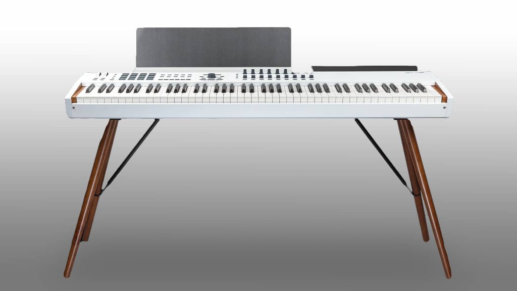 Smart accessories: A clip-on laptop stand and music stand attach conveniently to the back. (Image Source: Arturia) Smart accessories: A clip-on laptop stand and music stand attach conveniently to the back. (Image Source: Arturia)