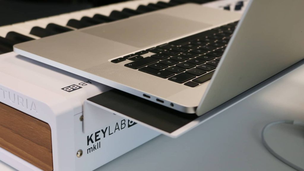 The laptop stand mounts to the back and provides stable support. The laptop stand mounts to the back and provides stable support.